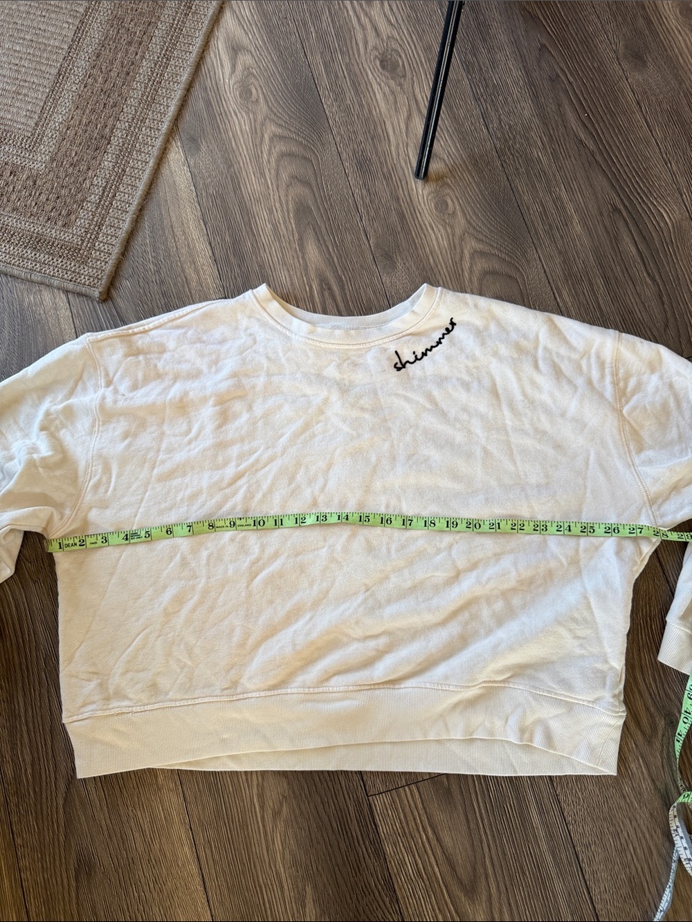 This cream Pilcro embroidered sweatshirt from Anthropologie features a "shimmer - Picture 9 of 12